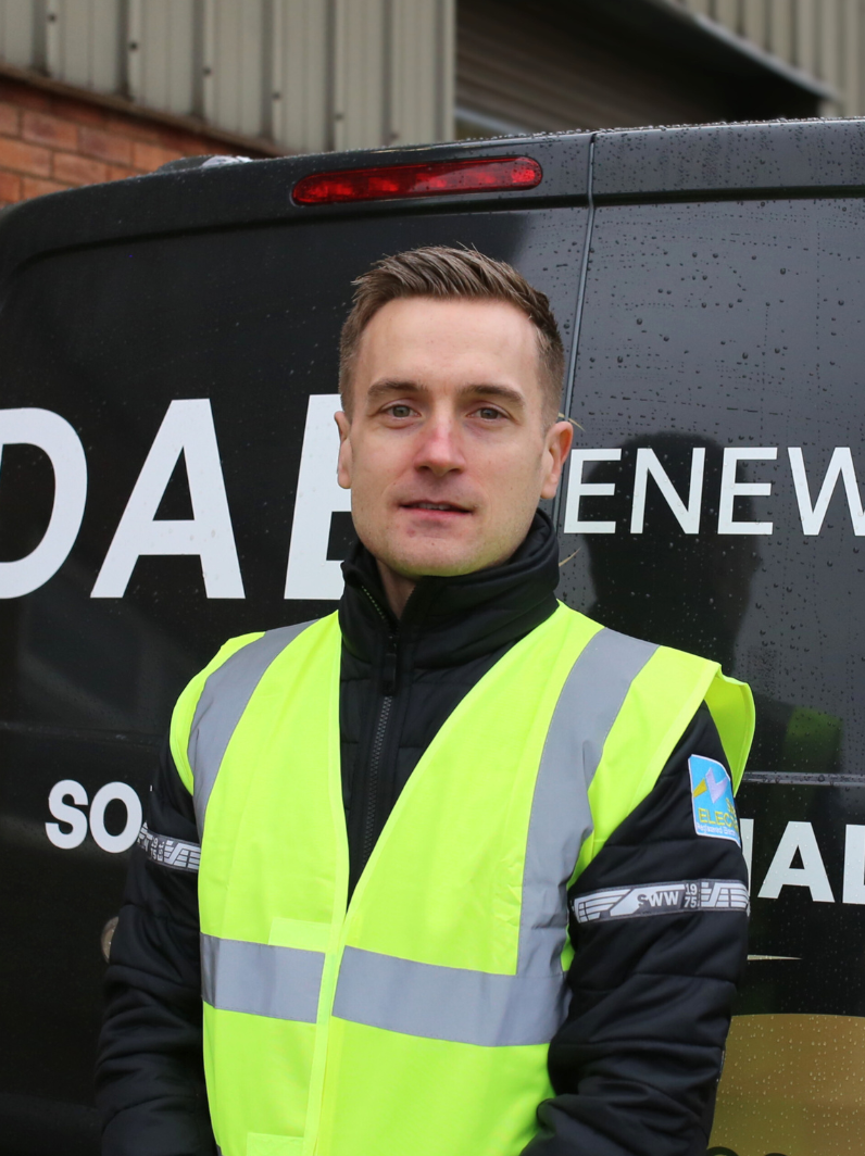 Andy Boylan, Director at DAE Renewables standing in front of DAE Renewables VAN