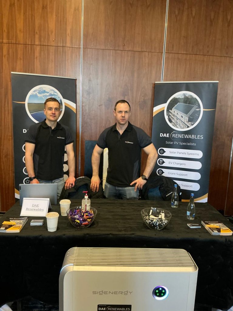 DAE Renewables at the SEAI Home Energy Show. Andy and Richie standing at the DAE Exhibition stand